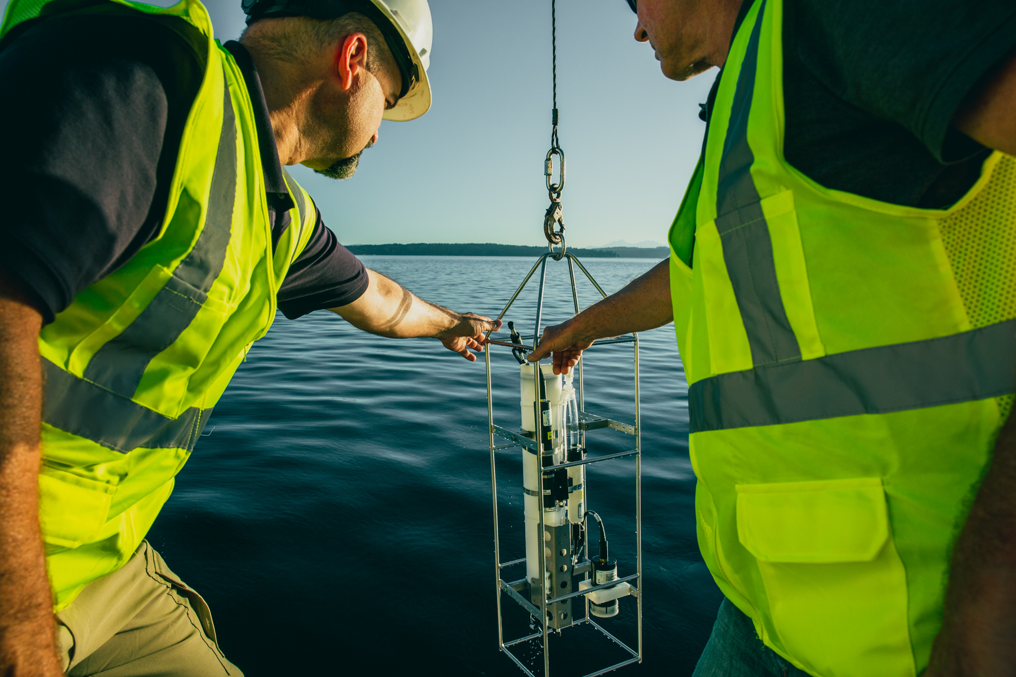 Oceanographers pulling in SBE 19plus V2 CTD
