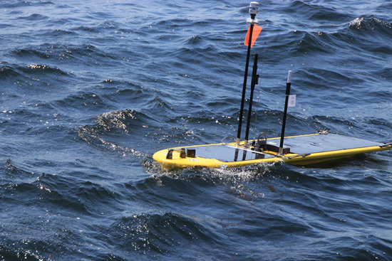 Photo of a flexible sampling platform in use on the open ocean - Seabird Scientific USV Sensor